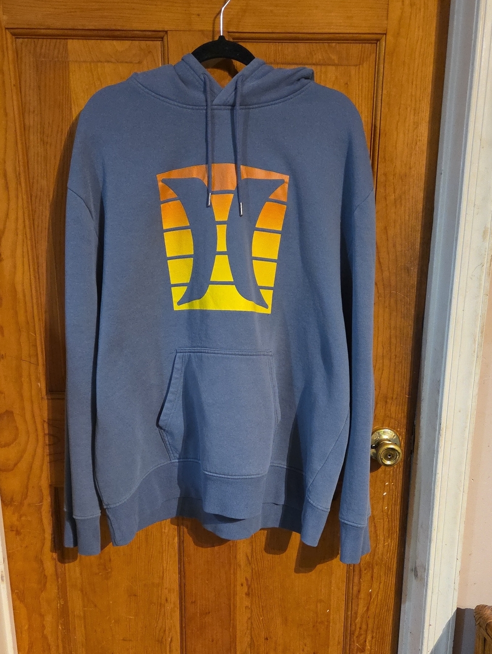 Hurley Blue Pullover Hoodie with Orange and Yellow Gradient Logo